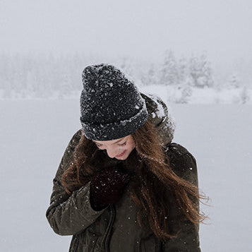 Woman walking through a blizzard